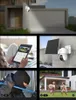 Collage of images showing a security camera installation, a person using a tablet to view camera feed, a close-up of a solar-powered camera, a burglar attempting to break in, and children playing in a yard. Anteprima dell’immagine prodotto
