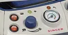 Close-up of a Singer brand steam iron's control panel. Náhled obrázku produktu
