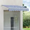 A striped awning is installed above a large window on the exterior of a building. Náhled obrázku produktu