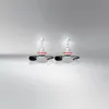 Two car headlight bulbs are displayed on a reflective surface against a gradient background. Náhled obrázku produktu