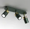 A ceiling light fixture with three adjustable spotlights. Produktbild-Vorschau