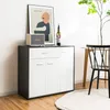 A modern sideboard with a speaker, framed artwork, and a bottle of wine on top, placed in a dining or living room setting. Anteprima dell’immagine prodotto
