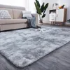 A living room scene with a sofa and a rug. Náhled obrázku produktu
