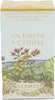 The image shows the front of a perfume box with an illustration of a garden scene. Náhled obrázku produktu