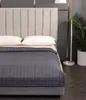 A bed with pillows and a weighted blanket. Podgląd zdjęcia produktu