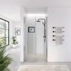 A modern bathroom with a glass shower enclosure, shower fixtures, and towel rack. Anteprima dell’immagine prodotto