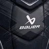 A close-up view of a Bauer X shoulder pad, showing the brand logo and textured material. Anteprima dell’immagine prodotto