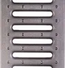 A close-up, straight-on view of a gray metal grate with horizontal openings and small circular indentations. Produktbild-Vorschau
