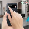 A hand is shown interacting with a smartphone case that displays an incoming call notification. Náhled obrázku produktu