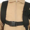 Close-up of a person wearing a tan costume with black straps and a black buckle. Náhled obrázku produktu