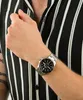 A person wearing a watch on their wrist. Podgląd zdjęcia produktu