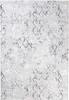 A close-up view of a rug with a diamond pattern. Produktbild-Vorschau