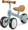 A blue Kinderkraft CUTIE balance bike with brown handlebars and seat, shown on a white background. Voir les images du produit