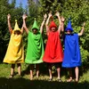 Unisex XXL Brettspiel Kostüm nicht ärgern Spielfiguren Gelb Grün Rot Blau von Vorne mit jubelnden Armen und Händen Produktbild-Vorschau