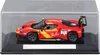 A die-cast model of a Ferrari 296 GT3 race car is displayed in a clear plastic case on a black base. Produktbild-Vorschau