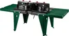 A router table with green metal legs and a black and green top surface, shown against a white background. Produktbild-Vorschau