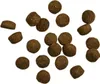 A collection of dry pet food kibble pieces scattered on a white background. Náhľad obrázku produktu