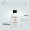 A bottle of leather lotion with product information and branding. Produktbild-Vorschau