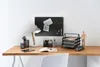 A desk setup with office supplies and a whiteboard. Produktbild-Vorschau