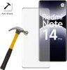 A smartphone screen protector is shown next to a hammer, demonstrating its anti-shock feature. A smartphone with the text 'Redmi Note 14 Pro' is also visible. Podgląd zdjęcia produktu