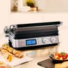 A close-up shot of a BRAUN Kontaktgrill CG9040 on a kitchen counter, with skewers of food and a bowl of salad nearby. Anteprima dell’immagine prodotto