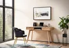 A modern home office setup with a wooden desk, chair, and artwork. Anteprima dell’immagine prodotto