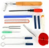 A collection of piano tuning tools laid out on a white background. Náhled obrázku produktu