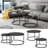 A modern living room with a sectional sofa and nesting coffee tables. Voir les images du produit