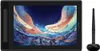 A black graphics tablet and stylus are shown on a white background. The tablet screen displays a colorful digital artwork. Produktbild-Vorschau