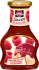A bottle of Schwartau raspberry dessert sauce with images of raspberries and ice cream. Produktbild-Vorschau
