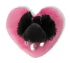 A plush toy in the shape of a pink heart with a black swan head emerging from it. Produktbild-Vorschau