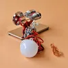 A scientific experiment model with a generator and a light bulb on a plain background. Náhľad obrázku produktu