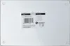 The back of a white cutting board with a label attached. Podgląd zdjęcia produktu