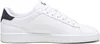 A side view of a white Puma sneaker with a navy accent on the heel. Produktbild-Vorschau