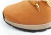 A close-up view of the toe of a brown Timberland boot. Produktbild-Vorschau