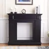 A black fireplace surround is shown in a room with decorative items on top. Anteprima dell’immagine prodotto