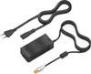 A black power adapter with two cables and connectors, laid out on a white background. Produktbild-Vorschau