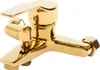 A close-up studio shot of a gold-colored faucet. Podgląd zdjęcia produktu