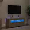 A TV stand with LED lights in a living room setting. Voir les images du produit