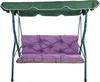 A garden swing with a green canopy and a purple cushion.