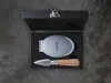 A set of oyster knives in a presentation box. Voir les images du produit