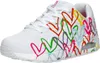 A single white sneaker with colorful heart graphics is shown from a side-diagonal view against a white background. Voir les images du produit