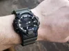 A person's wrist wearing a Casio watch. Podgląd zdjęcia produktu