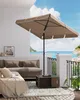 A patio scene with a sofa, umbrella, and a view of the ocean. Produktbild-Vorschau