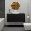 A modern bathroom with a vanity, sink, mirror, bathtub, and toilet. Náhled obrázku produktu