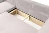 A close-up view of the storage compartment of a beige corduroy sofa. Produktbild-Vorschau