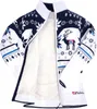 A white and navy knitted jacket with a reindeer and snowflake pattern, lined with white fuzzy material. Produktbild-Vorschau