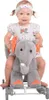 A young child is sitting on a plush elephant toy with wheels. Voir les images du produit