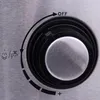 A close-up view of a control dial on a kitchen appliance, likely a coffee machine, showing settings for water and power. Produktbild-Vorschau