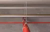 Pipes suspended from a ceiling with a mounting system. Anteprima dell’immagine prodotto
